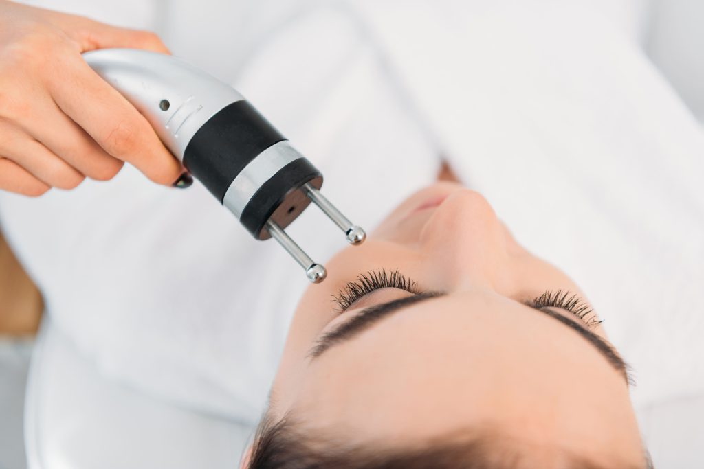 attractive-woman-getting-facial-microcurrent-thera-2024-11-19-02-49-44-utc
