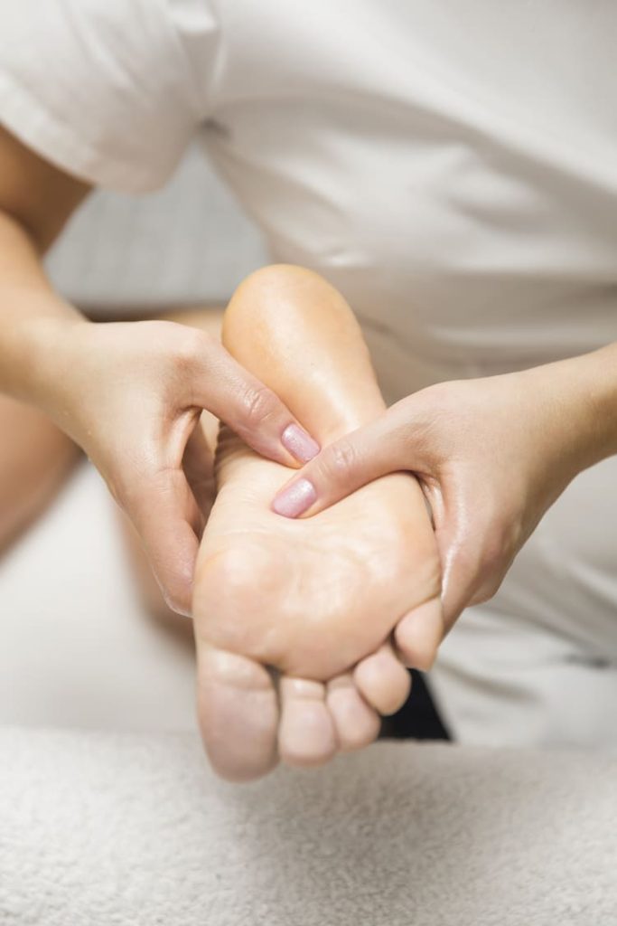 woman-receiving-foot-massage-in-spa-salon-2025-02-22-16-55-20-utc